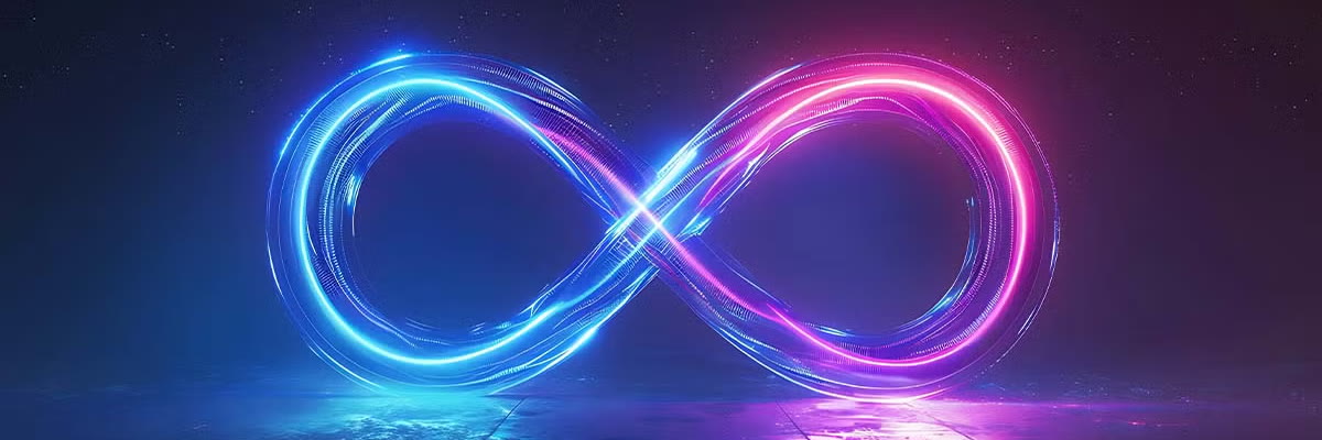A glowing neon infinity sign, blue fading to pink, reflected on a dark floor